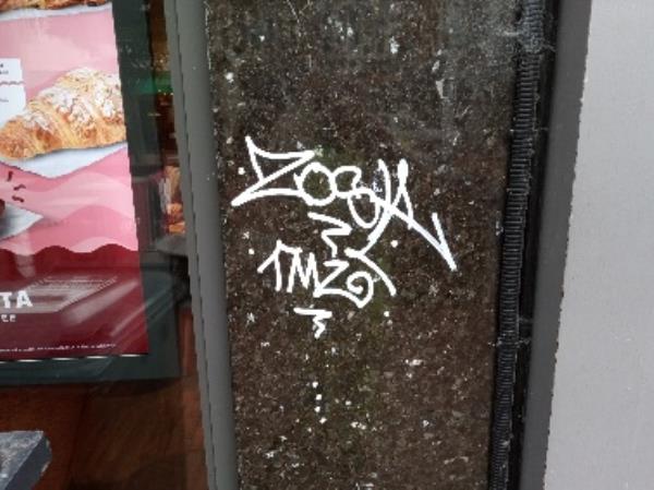 Graffiti on the pillar removed -97-98 Broad Street, Reading, RG1 2AX