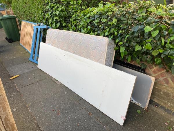 Looks like a bed and mattress and boards of some sort. Across road from 29 Northwood-29 Northwood Road, London, SE23 2HR