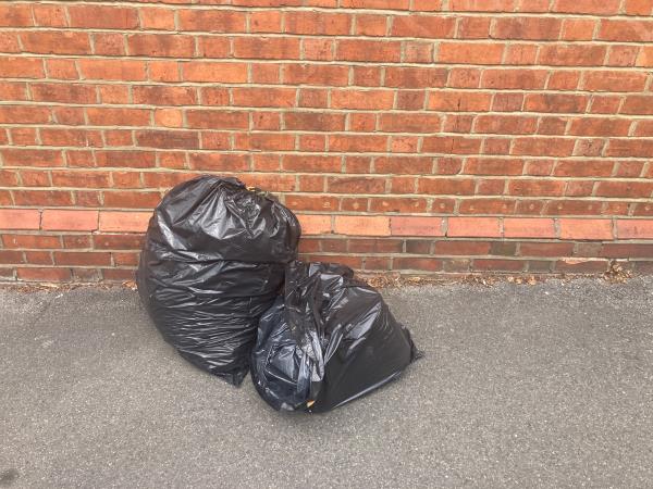 Two fly tipped black bags, Amherst Road -2 Wykeham Road, Reading, RG6 1PP
