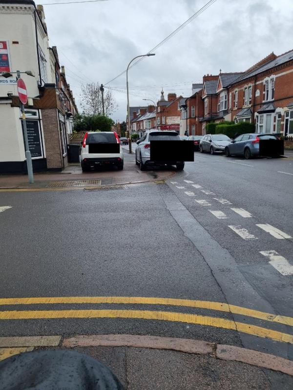 Car blocked pavement not even leaving space for pedestrians to cross let alonewheelchairs and pushchairs.-152 Clarendon Park Road, Leicester, LE2 3AF