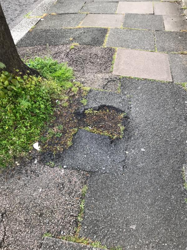 Cracked tarmac-8 Dunbar Road, Wood Green, London, N22 5BE