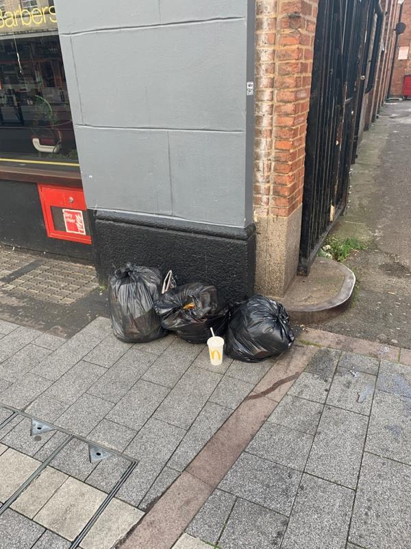 Fly tipping outside City Barbers on Rutland Street-124 Granby Street, Leicester, LE1 1DL
