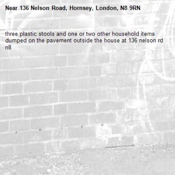 three plastic stools and one or two other household items dumped on the pavement outside the house at 136 nelson rd n8-136 Nelson Road, Hornsey, London, N8 9RN