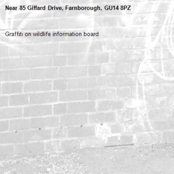 Graffiti on wildlife information board-85 Giffard Drive, Farnborough, GU14 8PZ