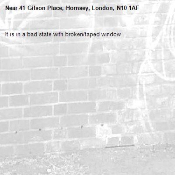 It is in a bad state with broken/taped window-41 Gilson Place, Hornsey, London, N10 1AF