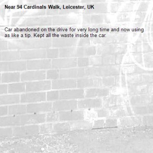 Car abandoned on the drive for very long time and now using as like a tip. Kept all the waste inside the car.-94 Cardinals Walk, Leicester, UK