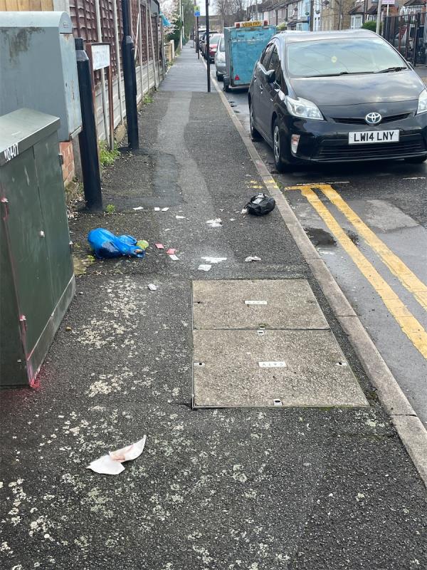 Broken Rubbish bags on pavement -68A, Idmiston Road, Stratford, London, E15 1RQ
