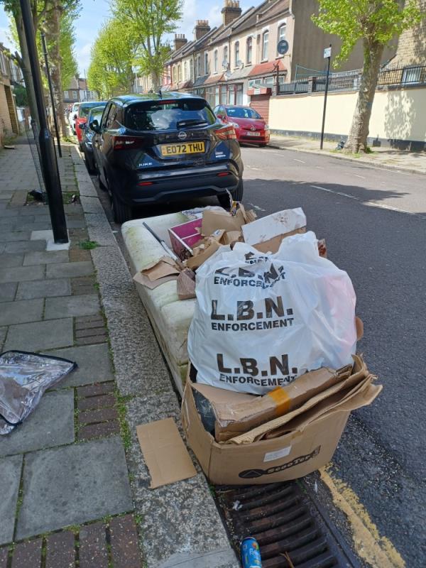 Sofa and cardboard boxes fly tipped at 24 St Dunstans Road, E7.-24 St Dunstans Road, Forest Gate, London, E7 8DB
