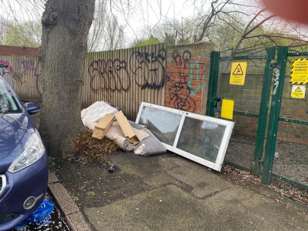 Dumped mattress and door and bags. -97 Western Road, Leicester, LE3 0GF