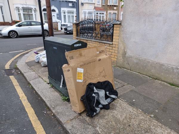 Cardboard box and a holdall fly tipped at 43 Walpole Road, E6. -43 Walpole Road, East Ham, London, E6 1AR