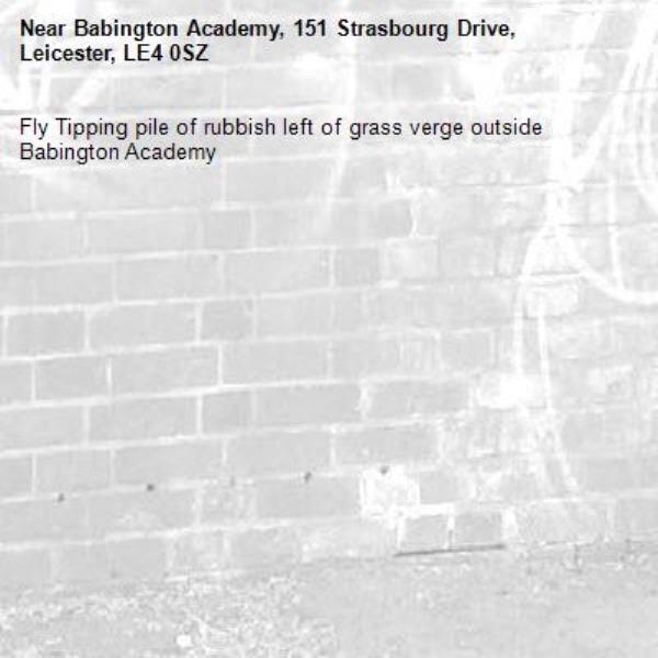 Fly Tipping pile of rubbish left of grass verge outside Babington Academy-Babington Academy, 151 Strasbourg Drive, Leicester, LE4 0SZ