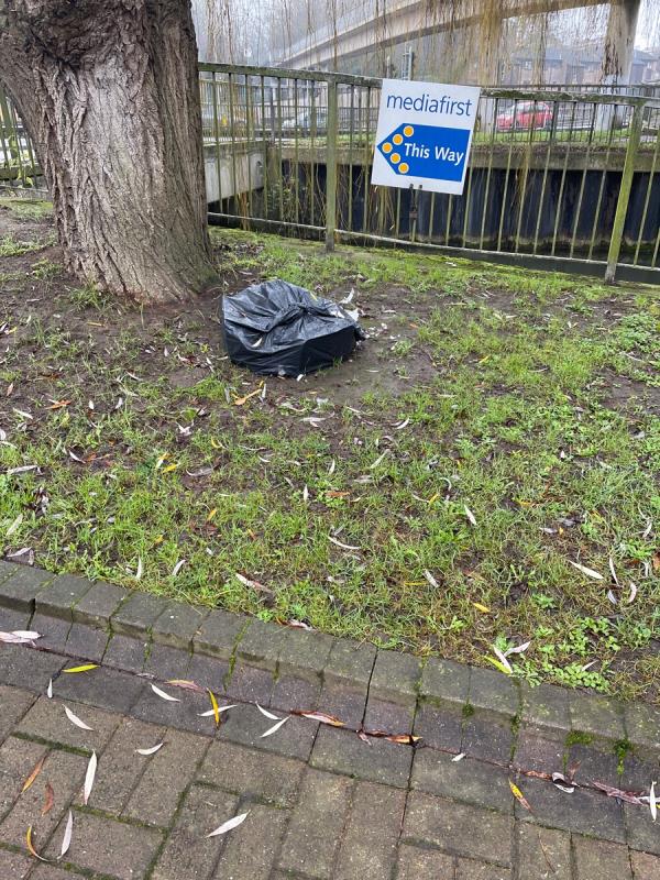 Black bag of rubbish dumped -24 New Bright Street, Reading, RG1 6QQ