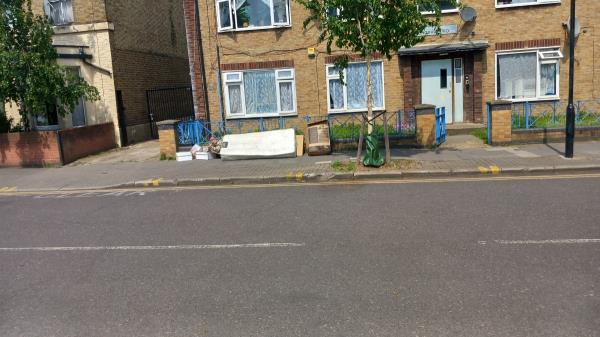 Mattress and other items fly tipped on the footway in front of 2A-2F Chobham Road Fri 2024-05-10.-2A, Chobham Road, Stratford, London, E15 1LU