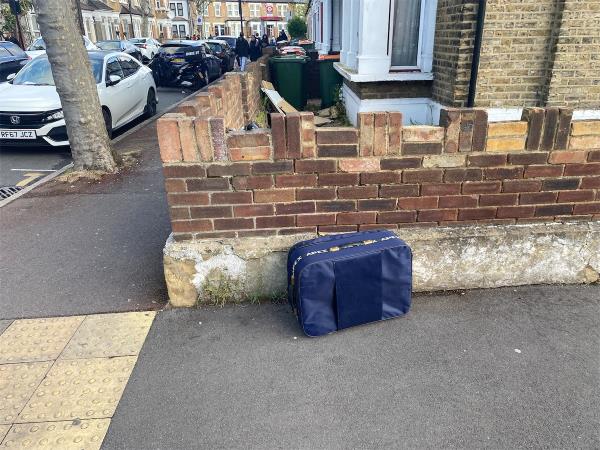 Suitcase dumped on corner of Byron avenue with browning road. -152A, Byron Avenue, Manor Park, London, E12 6NH