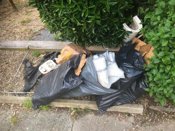 Junction of Headcorn Road. Please clear bags from corner plot-320 Downham Way, Bromley, BR1 5NR