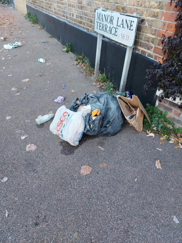 Bags of household rubbish dumped-41 Lochaber Road, Hither Green, SE13 5QU, England, United Kingdom
