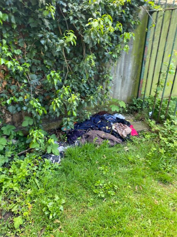 Clothes dumped -62 Russell Avenue, Wood Green, London, N22 6PR