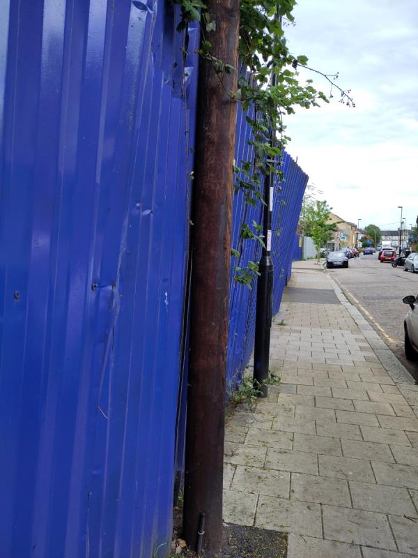Corrugated metal fence slowly leaning more and more towards public footpath.  Seems supported by lamp post...-Flat 1, Shafe Court, 78-82 Nightingale Grove, Hither Green, London, SE13 6DZ