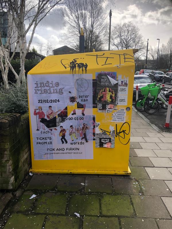 Remove flypostering from clothing bank-St James Road Public Convenience, St James's, London, SE14 6AH