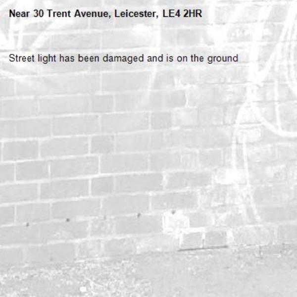 Street light has been damaged and is on the ground -30 Trent Avenue, Leicester, LE4 2HR