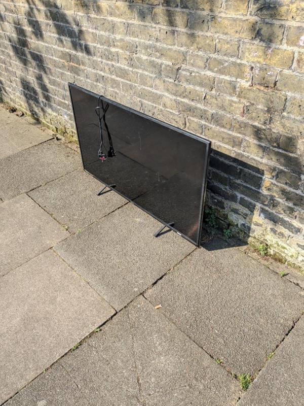 TV dumped on pavement -61A, Bolton Road, Stratford, London, E15 4JY