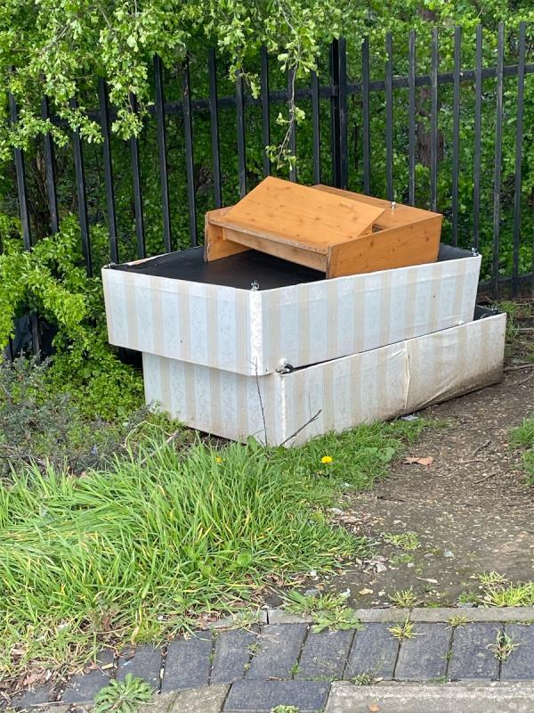 Per base and cabinet in corner off road by railings of East Ham Nature Reserve / St Mary Magdalene Church Yd at NE junction of A13 and High St S-45 Stonewall, Beckton, London, E6 6NY