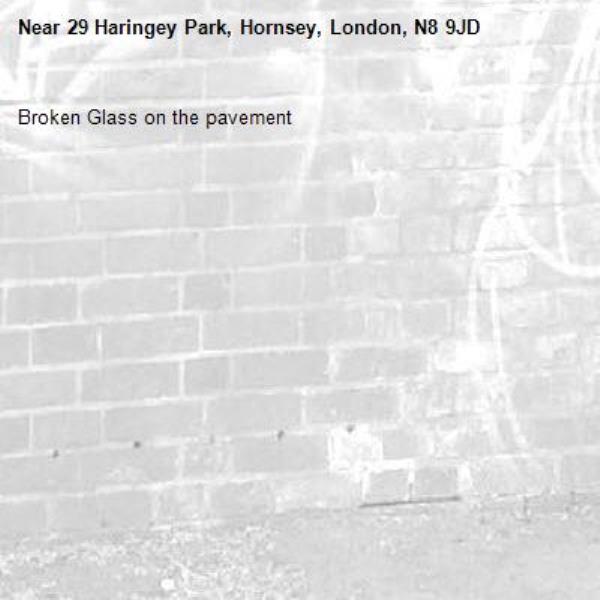 Broken Glass on the pavement -29 Haringey Park, Hornsey, London, N8 9JD