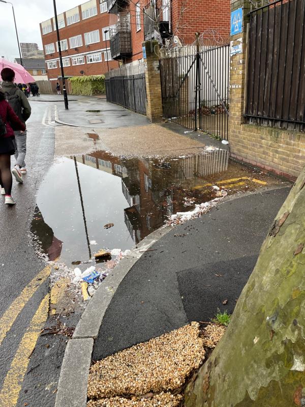 Massive puddle obviously blocked drains.-98 Freemasons Road, Canning Town, London, E16 3NA