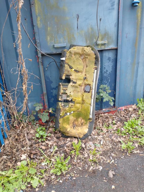 Car seat, By container next to barrier Glen Road. -Boundary Lane, East Ham, London