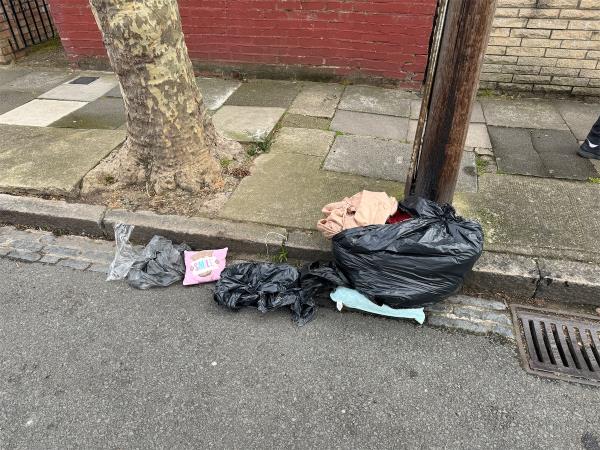 Dumped clothes and other items-60 Bolton Road, Stratford, London, E15 4JY