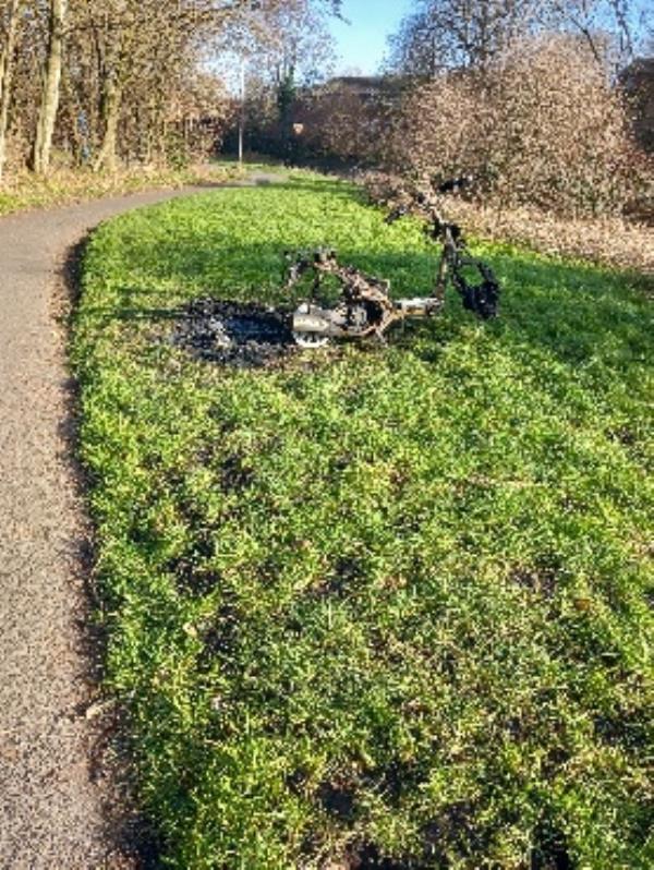 burnt remains of a moped. Ellis Meadows -140 Ross Walk, LE4 5HH, England, United Kingdom
