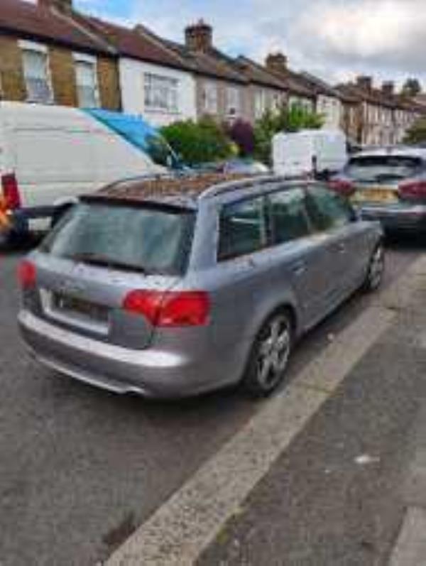 Appears to be a dumped car on the road with the plates removed.
-55 Glenfarg Road, London, SE6 1XN