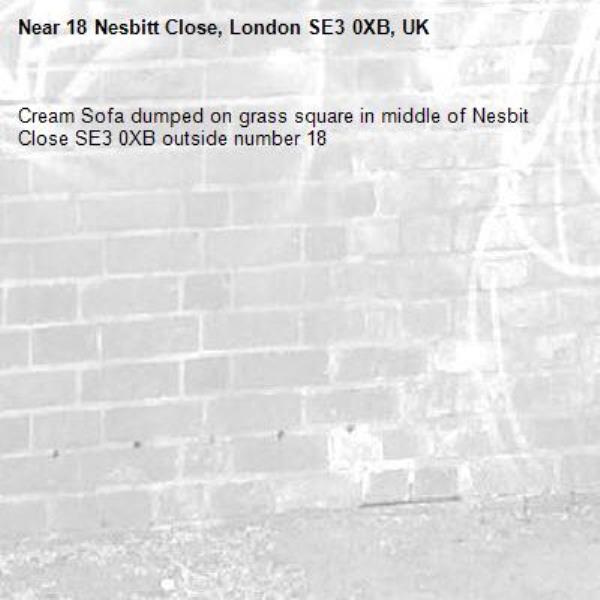 Cream Sofa dumped on grass square in middle of Nesbit Close SE3 0XB outside number 18-18 Nesbitt Close, London SE3 0XB, UK
