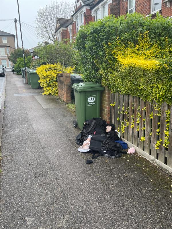 Clothes dumped-76 Faversham Road, London, SE6 4XF