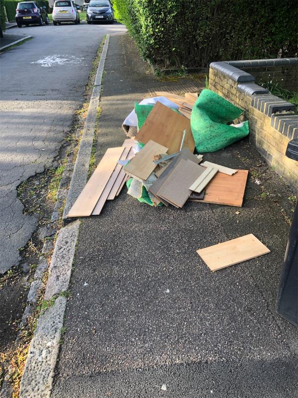 Please clear flytip of laminated flooring-221 Reigate Road, Bromley, BR1 5JL