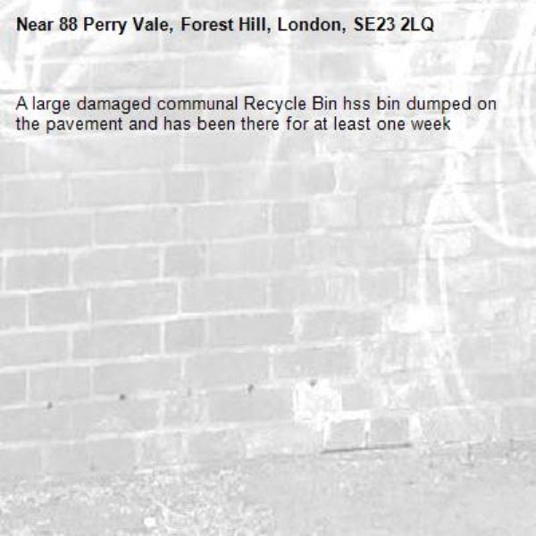 A large damaged communal Recycle Bin hss bin dumped on the pavement and has been there for at least one week-88 Perry Vale, Forest Hill, London, SE23 2LQ