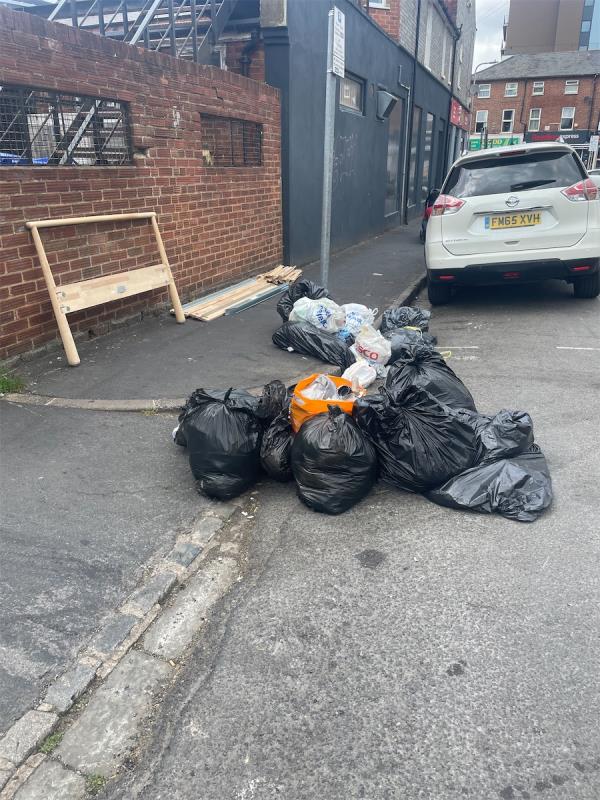orghousehold rubbish left after Peri peri bins removed Sat morning. unacceptable to hv to walk past this for residents. -Basement Flat, 3 Zinzan Street, Reading, RG1 7UG
