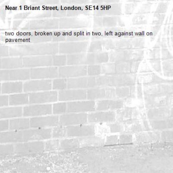 two doors, broken up and split in two, left against wall on pavement -1 Briant Street, London, SE14 5HP