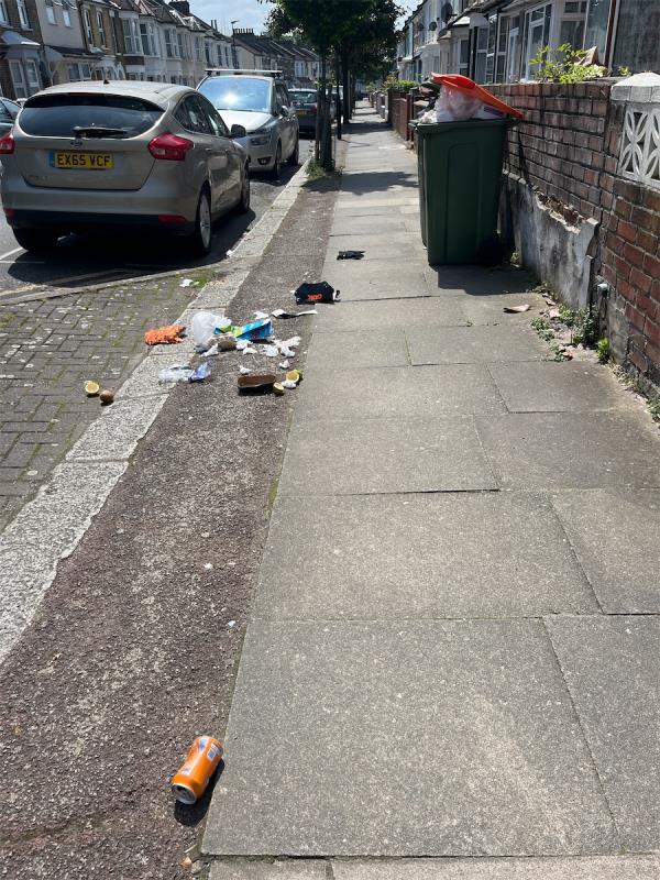 Overflowing bins from 84 littering street-86A, Caistor Park Road, Stratford, London, E15 3PS
