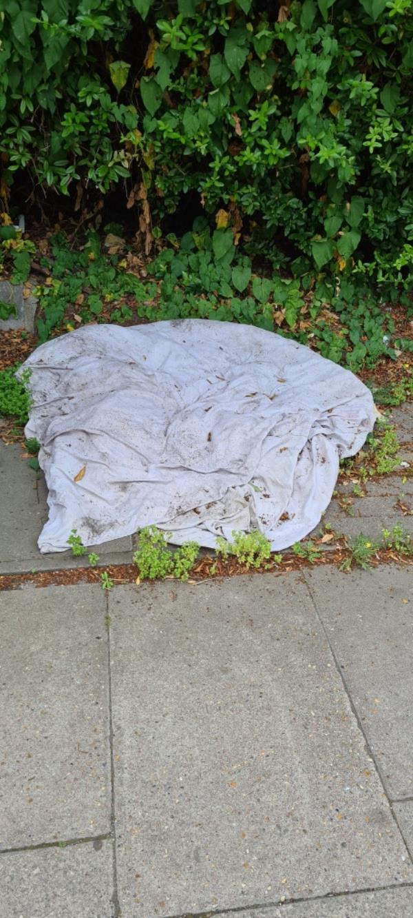 Dumped bedding by bus stop -Browne House Deptford Church Street, London, SE8 4SE