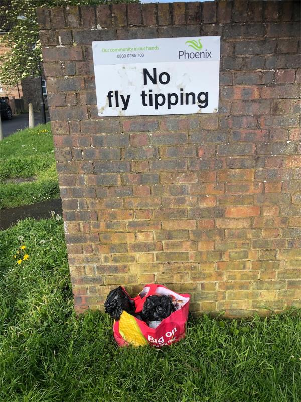 Please clear dumped bags from grass area-1 Wicks Close, Grove Park, London, SE9 4HE