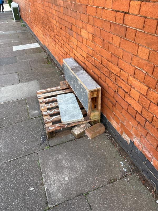 Wood and bricks dumped -11 Compton Road, Leicester, LE3 2AA