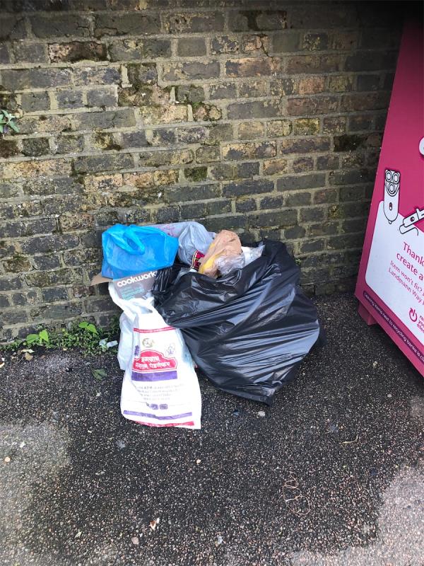 Side of Electrical Recycling banks. Please clear dumped bags-Kinley Folkard And Hayard, 1 Station Approach, Burnt Ash Hill, London, SE12 0AB