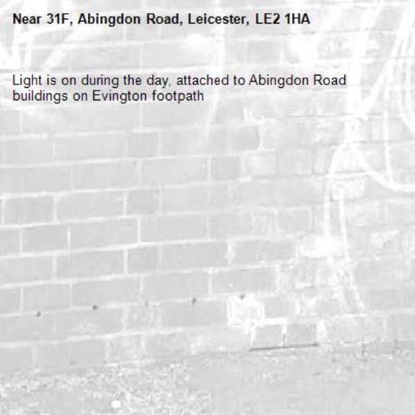 Light is on during the day, attached to Abingdon Road buildings on Evington footpath -31F, Abingdon Road, Leicester, LE2 1HA