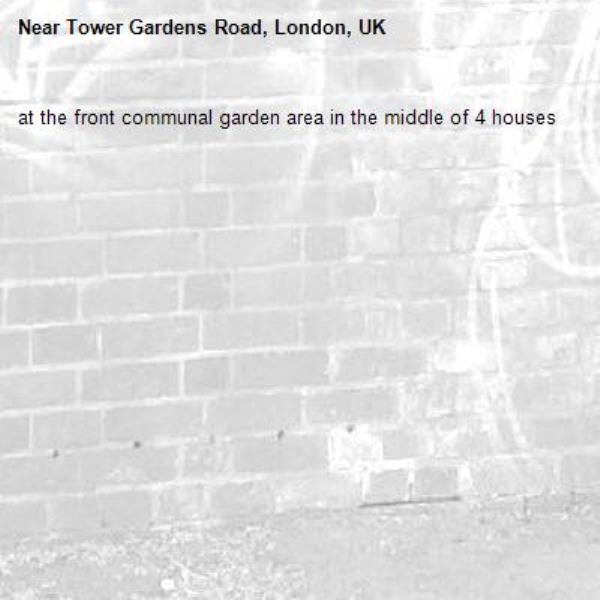 at the front communal garden area in the middle of 4 houses -Tower Gardens Road, London, UK