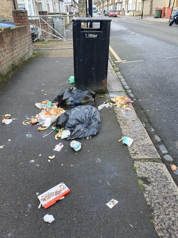 Bin bags and waste in street scattered about.  -78 Stamford Road, East Ham, London, E6 1LR