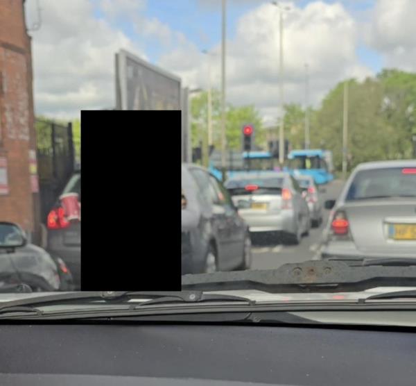Beggers on road walking in between cars causing disruption. This picture was taken a few days back. I drove pass today at 9.45 am today 7/5/24 and i saw 2 women doing the same -163 Humberstone Road, Leicester, LE5 3AP