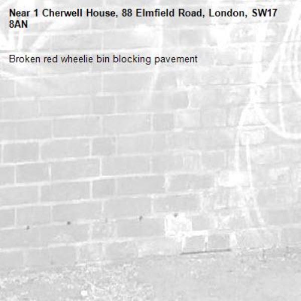 Broken red wheelie bin blocking pavement -1 Cherwell House, 88 Elmfield Road, London, SW17 8AN