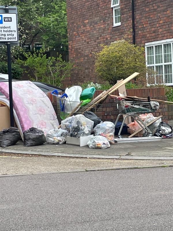Opposite Holly Lodge, near the car park for estate, mattress and several bags have been dumped -Holly Lodge, Wisteria Road, Hither Green, London, SE13 5HW