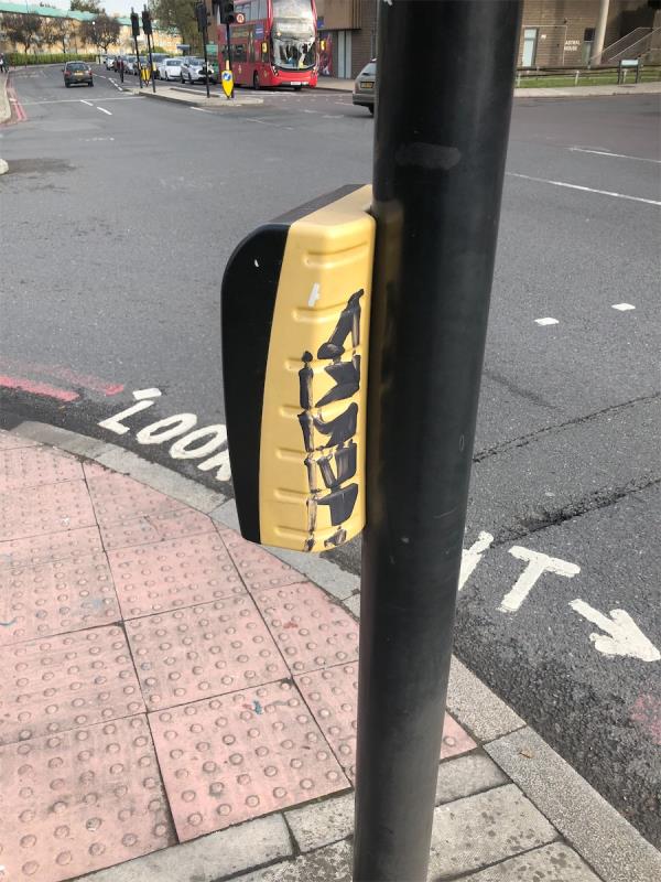 Junction of Southend Lane. Remove graffiti from traffic light push button panel-Bromley Road, London